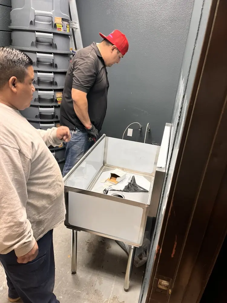 Commercial plumbing and sink installation in Post Oak
